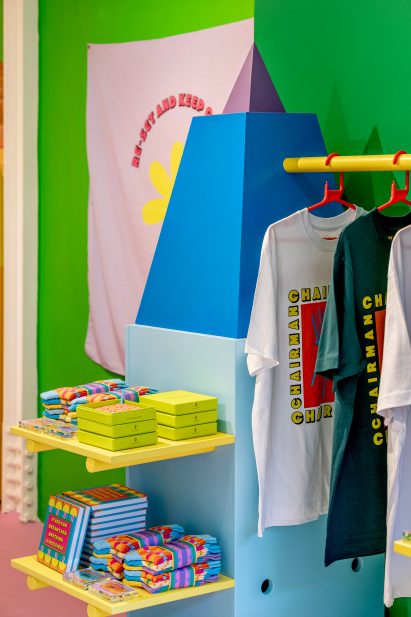 Modular display stand with clothes rail and shelves