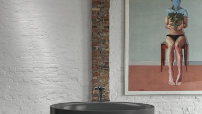 Grey bath in industrial interior
