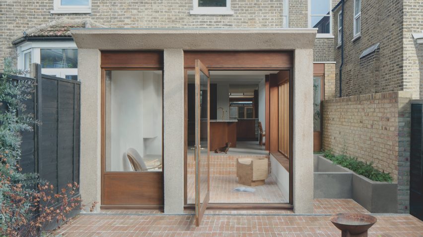 Cast House extension by EBBA features brown concrete and vaulted ceiling
