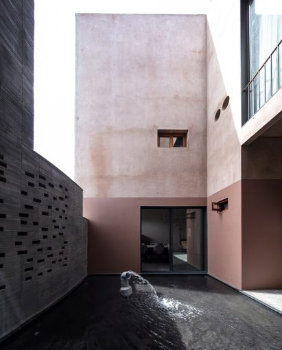 Image of a courtyard with a shallow pool