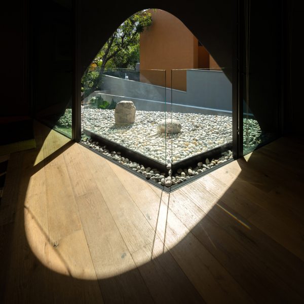 Arched window in concrete home in Mexico