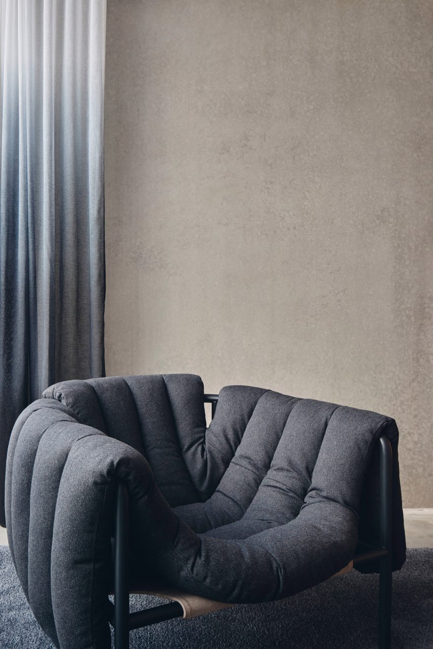 Lounge chair in the interior of The Courtyard Residence by FGR Architects