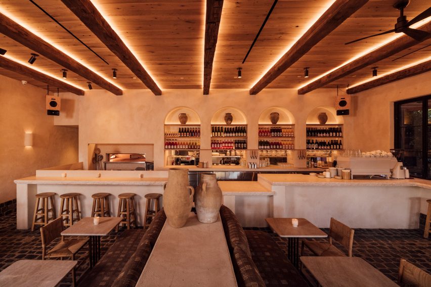 Arched niches behind Portuguese stone bar