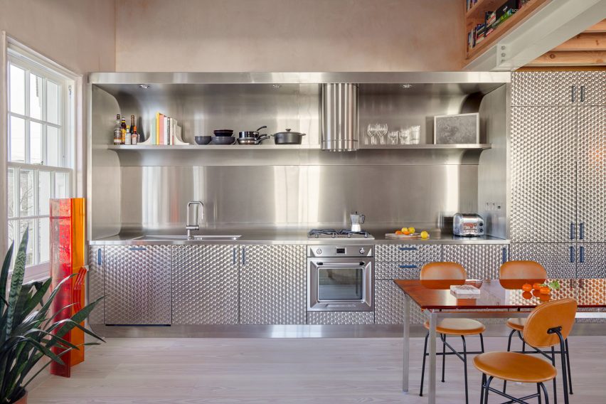 Kitchen in apartment by Holloway Li