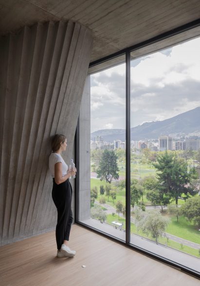 Woman inside apartment at Iqon tower in Quito
