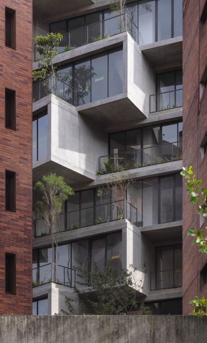 Concrete balconies of the Iqon tower in Quito by BIG