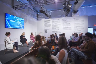 Event with speaker discussing Kohler's tiled installation