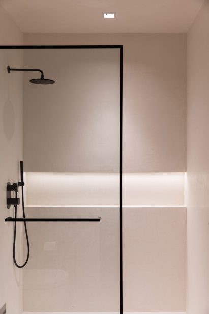 Minimalist walk-in shower in Lilla Lane house