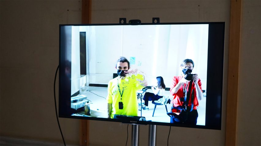 TV screen showing MYOM students
