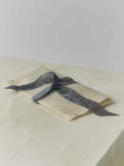 Pouch-shaped gift wrap for Calvin Klein