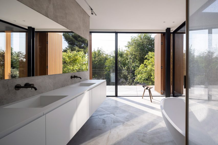 Wood Slatted House by Pitsou Kedem