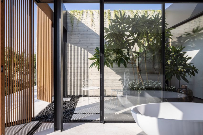Wood Slatted House by Pitsou Kedem
