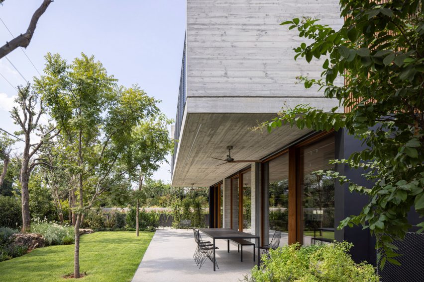 Wood Slatted House by Pitsou Kedem