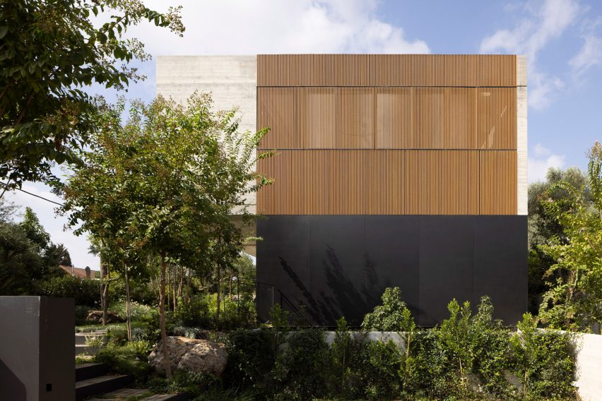 Wood Slatted House by Pitsou Kedem