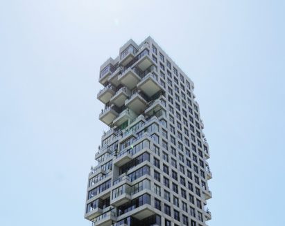 Detail image of the top of the Quora residential tower