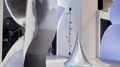 Dutch design studio Random Studio has created a "futuristic" pop-up for French fashion brand Mugler with curving forms, shaped like a woman's body, to celebrate the 30th anniversary of the brand's fragrances.