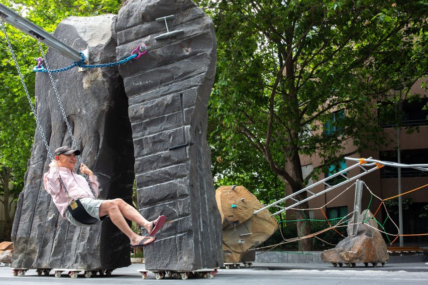 Ruogh hewn bluestone boulders of Mike Hewson's Rocks on Wheels playground sculpture in Melbourne