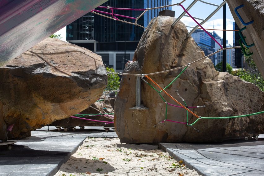 sandpit and boulders of Mike Hewson's Rocks on Wheels playground sculpture in Melbourne