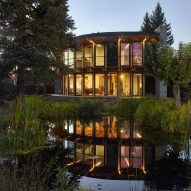 Image of House that Opens up to the Sun by a pond