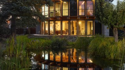Image of House that Opens up to the Sun by a pond