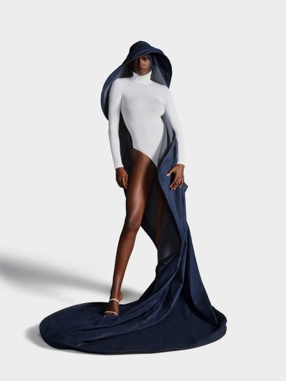Image of a woman wearing a couture Stephen Jones denim hat