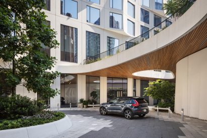 Car port with oculus in skyscraper podium 