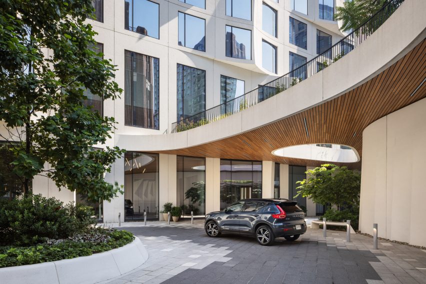 Car port with oculus in skyscraper podium