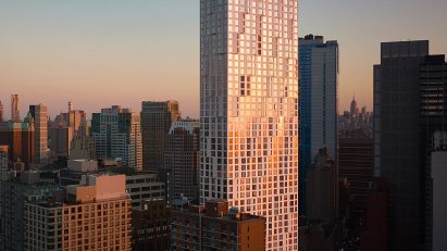 11 Hoyt skyscraper recflecting the sunset with downtown brooklyn in background