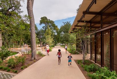 Trees surrounding dogtrot restrooms