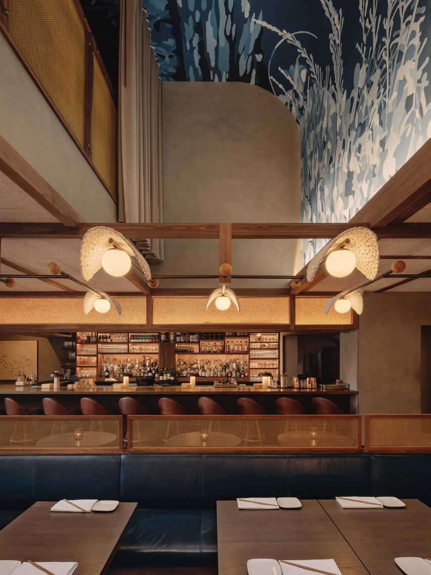 Blue mural curves up towards mezzanine level
