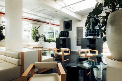 Chairs in front of large speaker cabinets