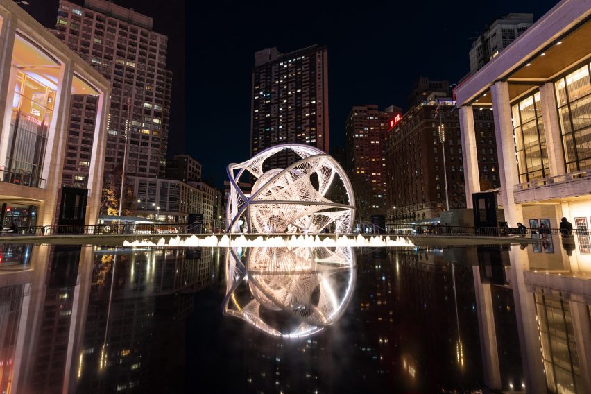 A glowing rounded installation by Es Devlin