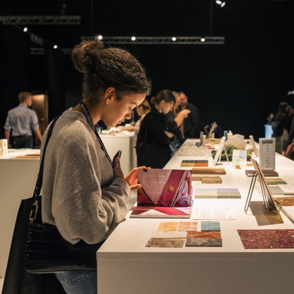 Photo of a person looking at a book