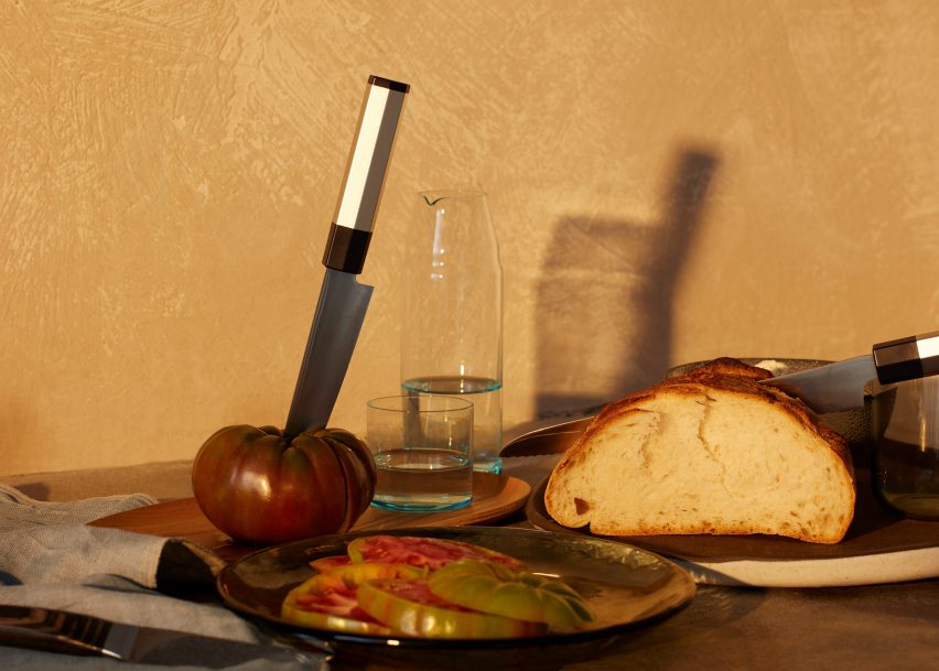 Photo of foot and kitchenware on a surface