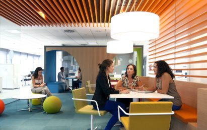A group of students at IE University in a working space