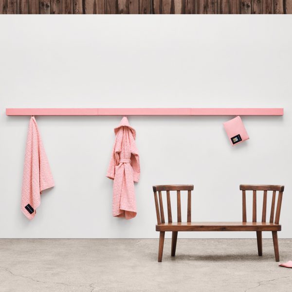 Image of a bench and clothing rail