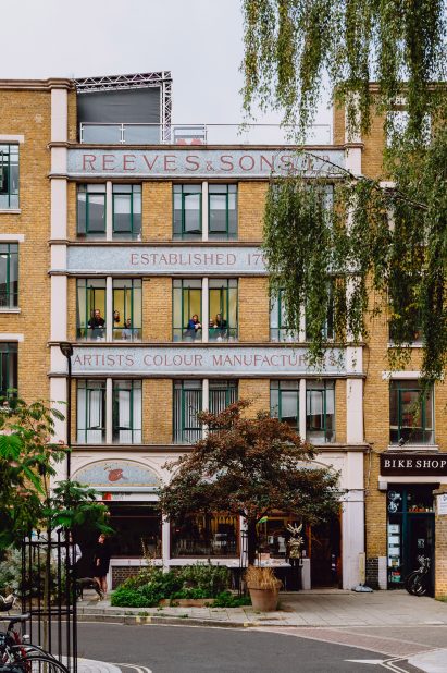 Picture of a three-storey building that previously was a paint-making business