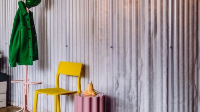 Office S&M unveils its own colourful office with plastic-bottle-wall enclosed meeting room