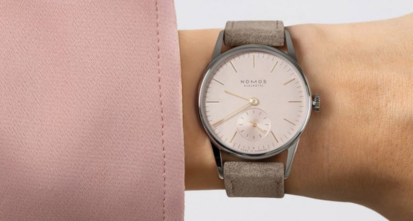 Pink watch with brown strap
