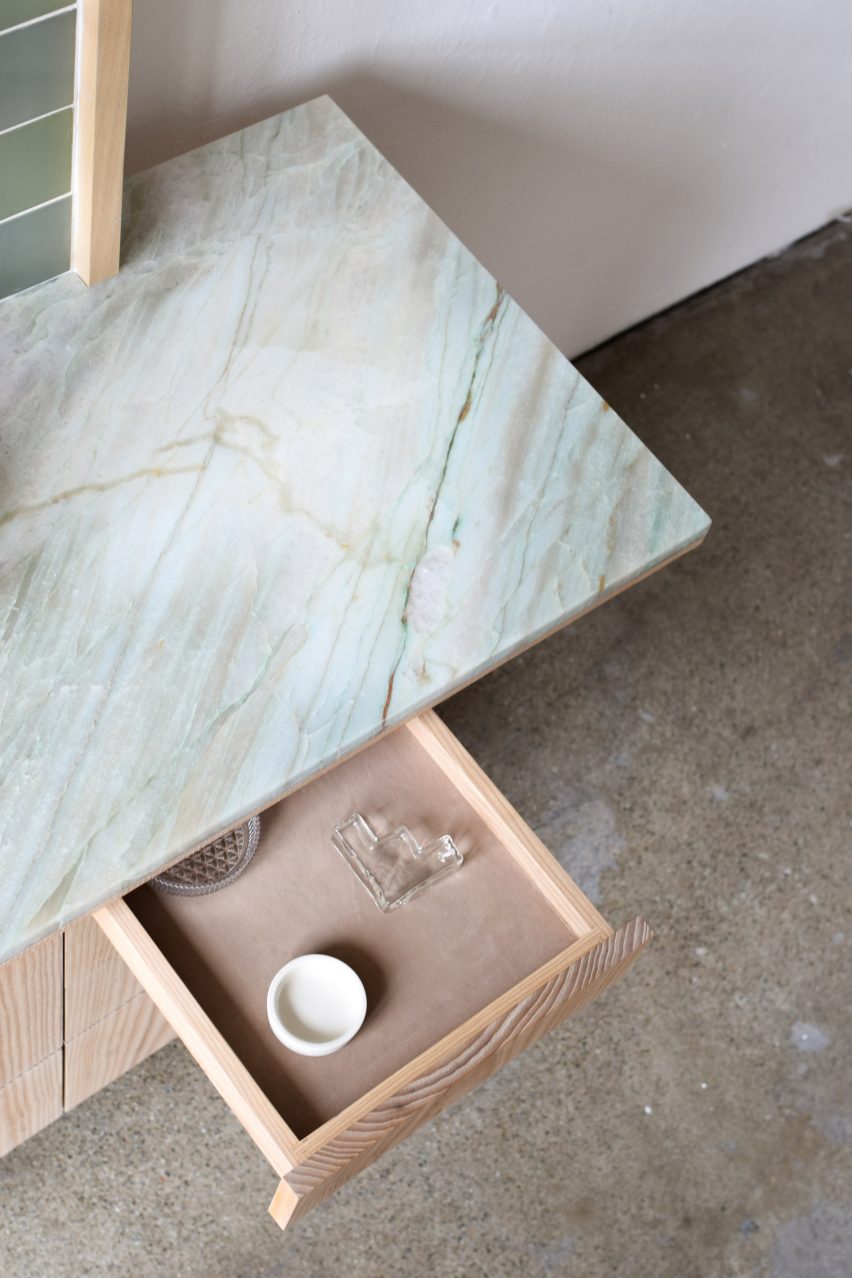 Photograph of drawer containing glass pipe
