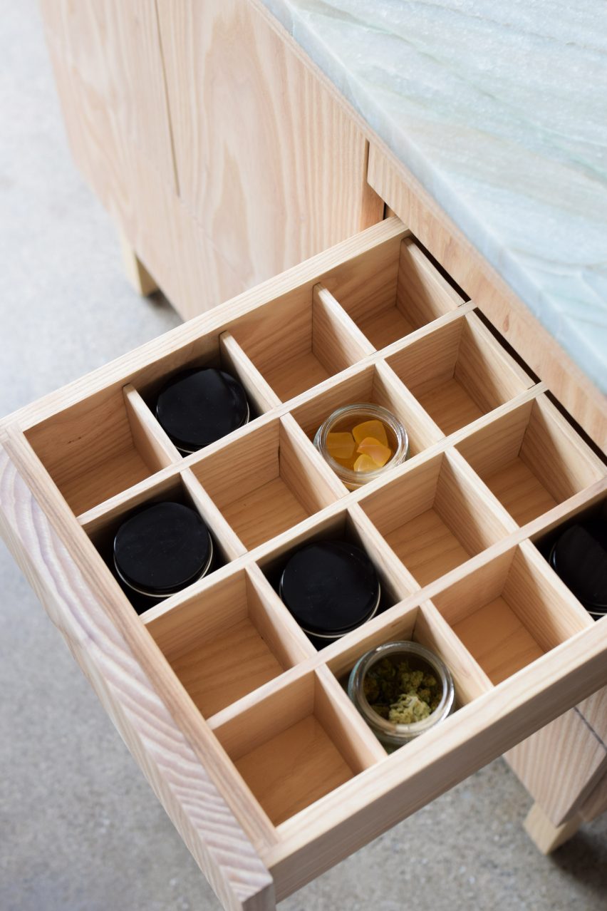 Photograph of drawer containing compartments with jars