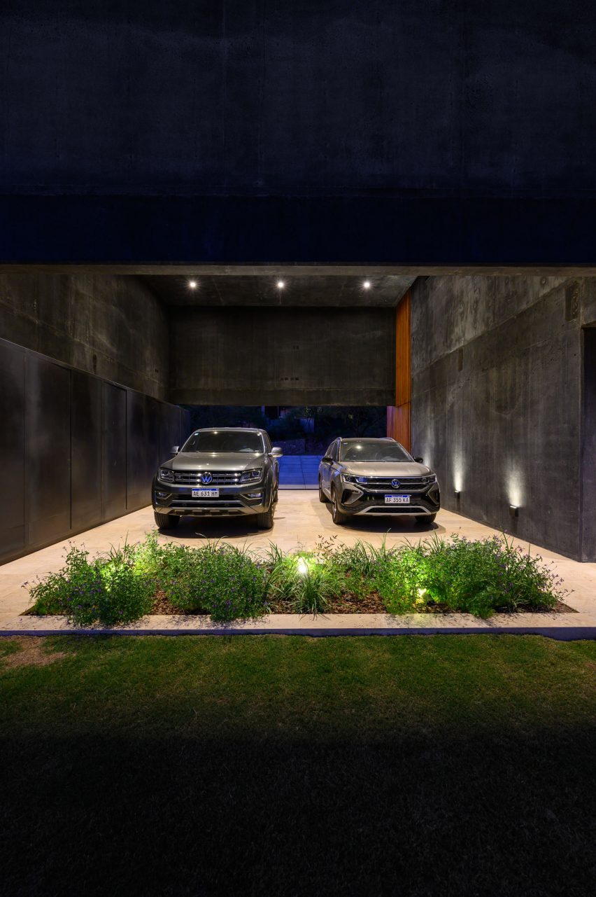 Lower ground parking space at the Black House by AR Arquitectos