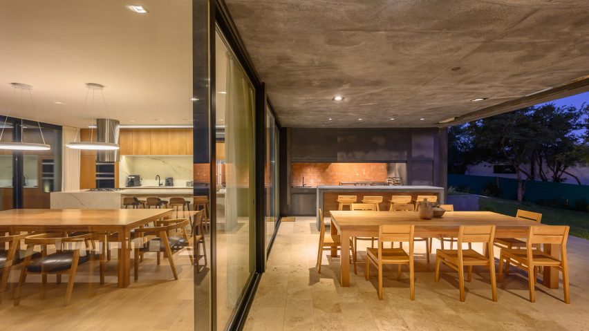 Exterior dining space at the Black House by AR Arquitectos