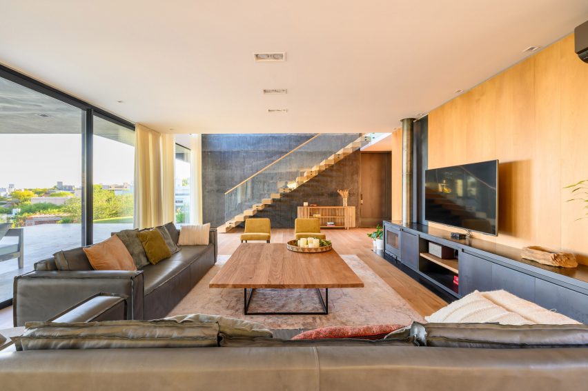 Interior of the black concrete house by AR Arquitectos