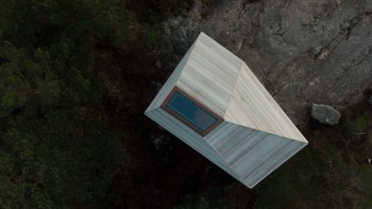 Aerial view of wooden cabin by Snøhetta