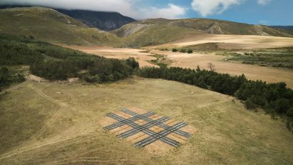 Photograph of a meadow in South Africa with a large-scale temporary installation
