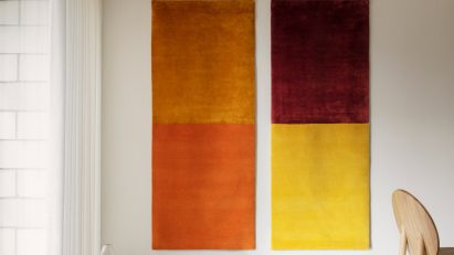 Two dual-colour tapestries on a wall