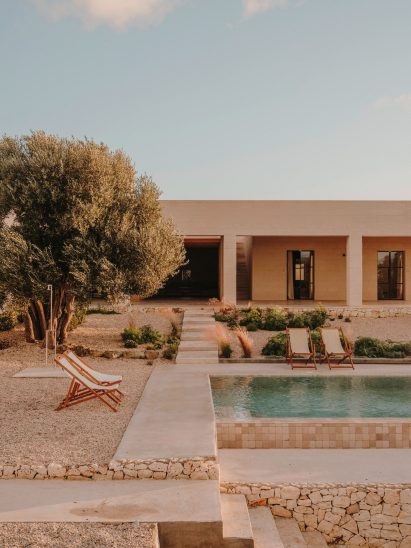 View of pool outside Italian villa