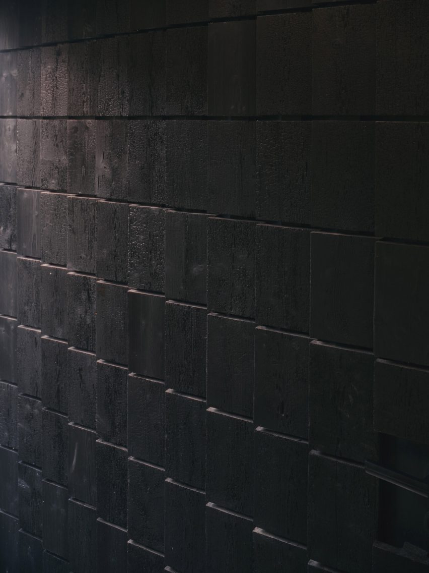 Charred timber cladding of Dark Matter garden studio by Hyper