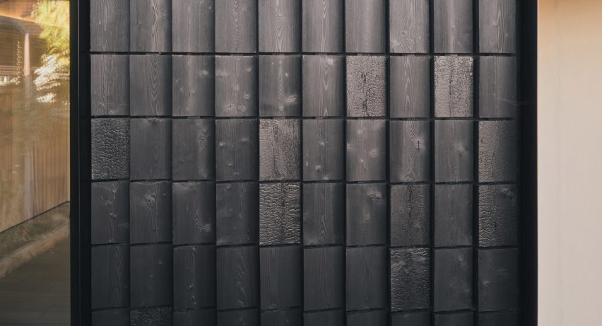 Charred timber cladding of Dark Matter garden studio by Hyper